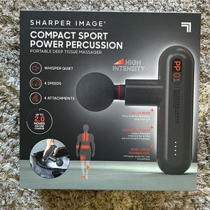Sharper image compression sport massager. New and still sealed in box